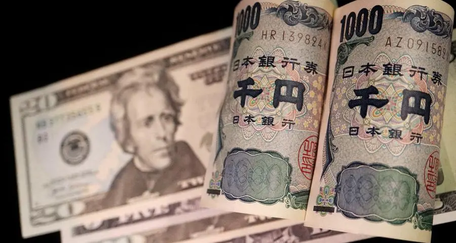 Yen firms after less dovish BOJ, dollar dips ahead of inflation data