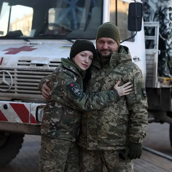 'Together for now': Ukrainian families serving on the front