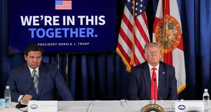 Trump, DeSantis offer stark contrast in first Iowa forays