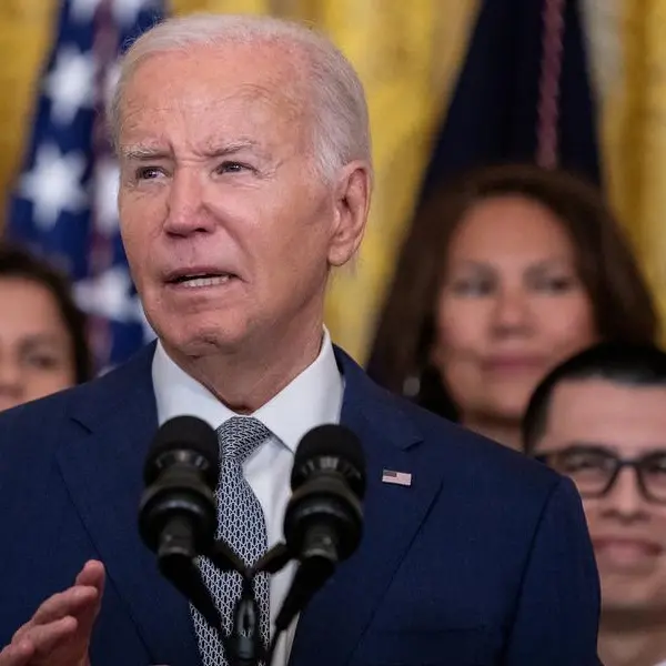 Biden takes fresh immigration moves into debate with Trump