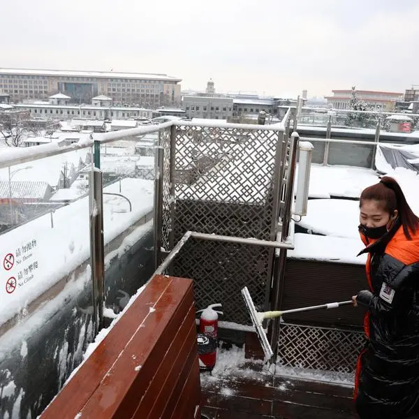 Snowfall shrouds north China in prelude to even colder weather