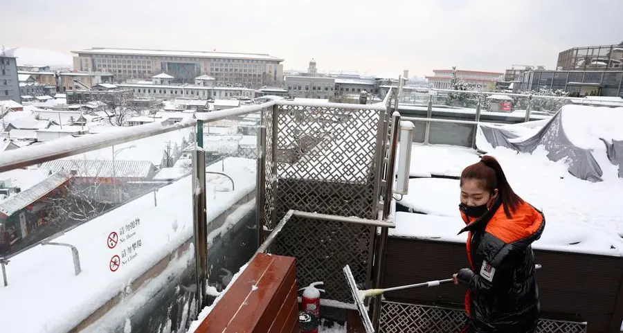 Snowfall shrouds north China in prelude to even colder weather