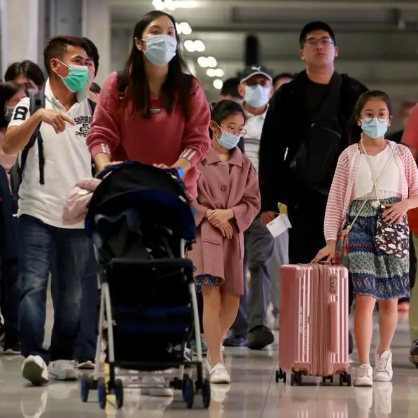 China tourist trips top pre-pandemic levels over May Day break, revenues still lower