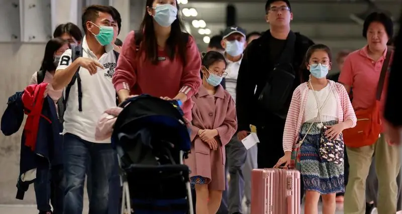 China tourist trips top pre-pandemic levels over May Day break, revenues still lower