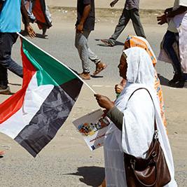 Protesters march across Sudan as economy spirals