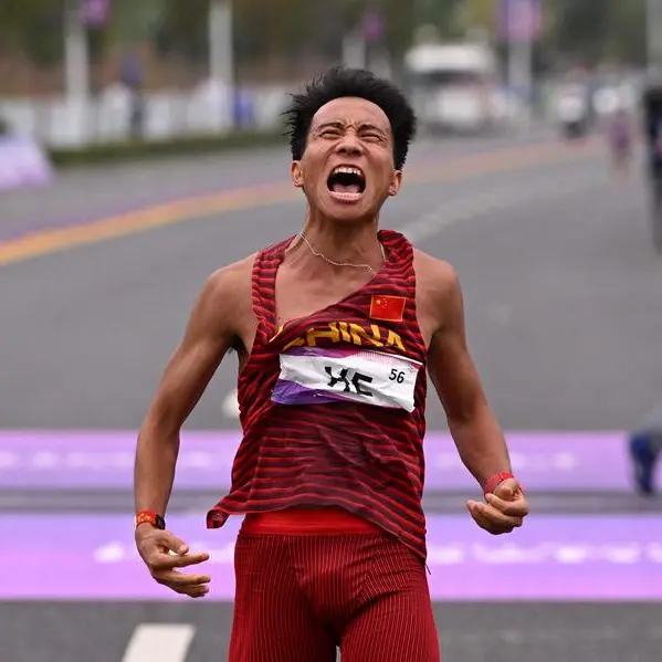 Beijing half marathon runners stripped of medals after controversial finish