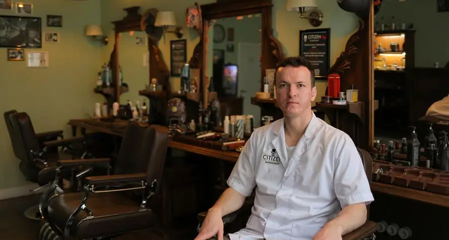 Moscow barbers describe fight for survival as mobilisation cuts staff and customers
