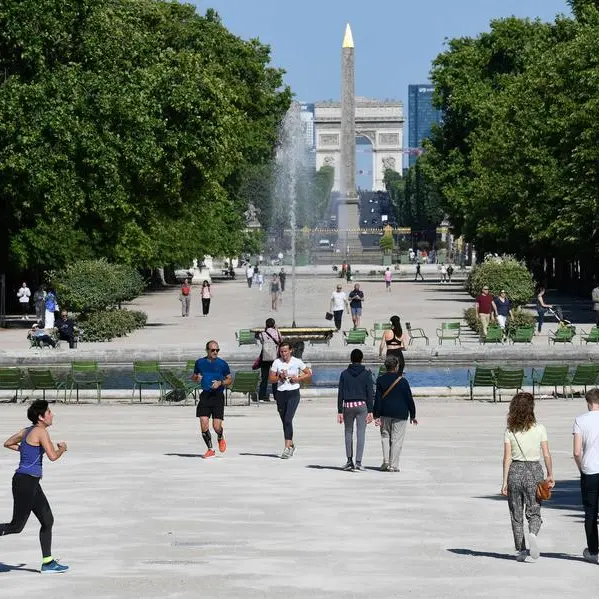 Olympic flame to burn near Louvre during Paris Games: source