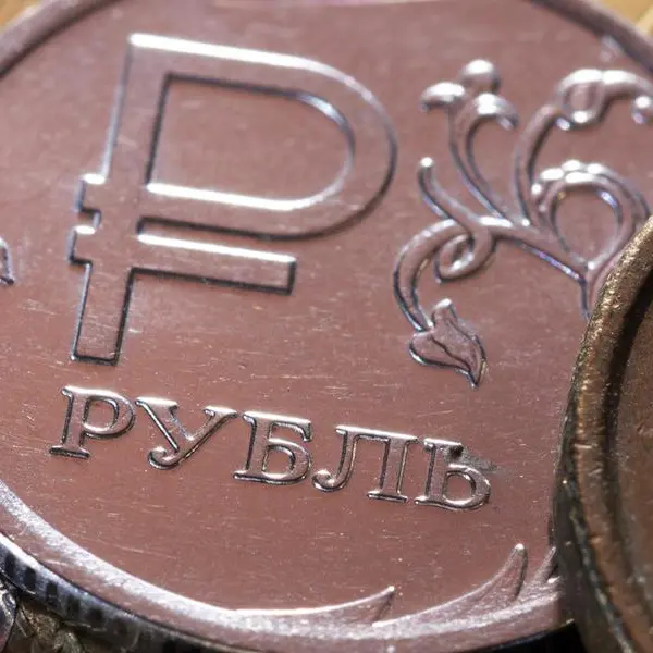 Russian rouble eases towards 62 vs dollar, stocks fall