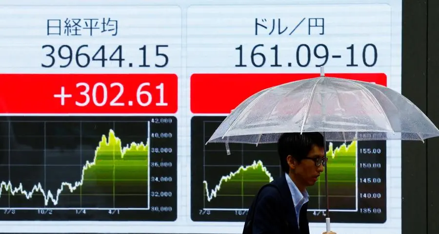 Asia stocks hold steady as more rate cuts loom