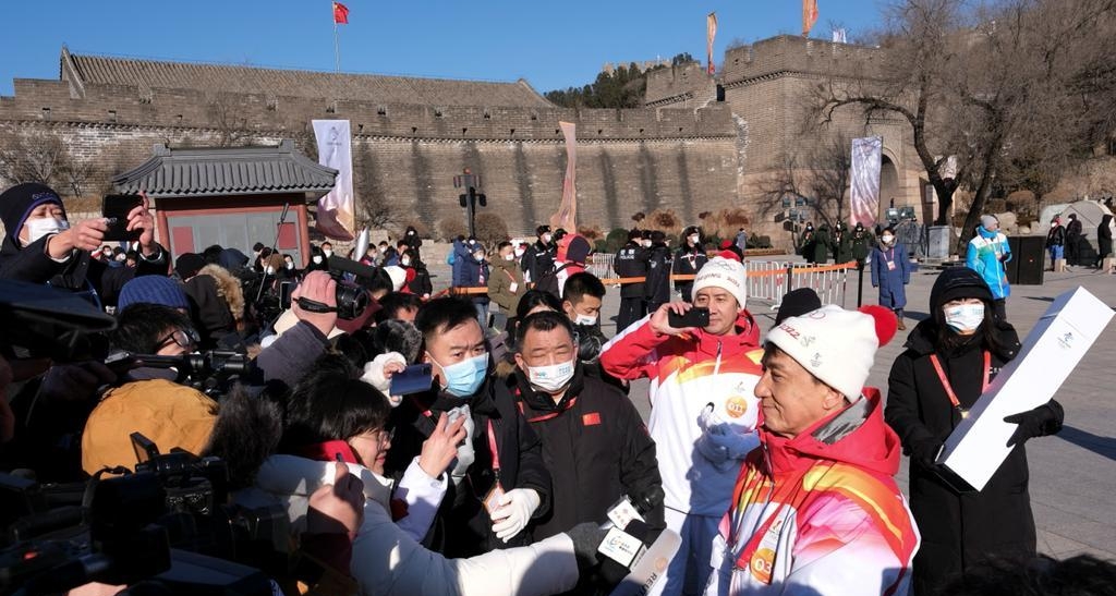 Olympics: Actor Jackie Chan carries Olympic torch atop Great Wall