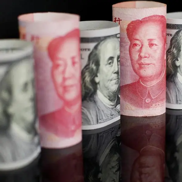 China's yuan extends slide, stocks rebound after fire sale