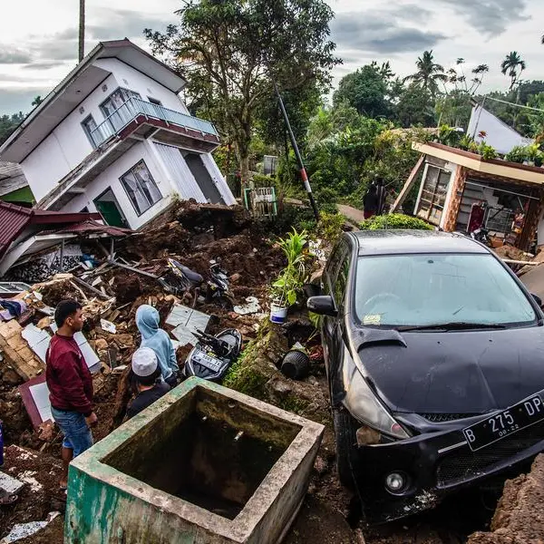 Hunt for buried survivors after Indonesia quake kills 162