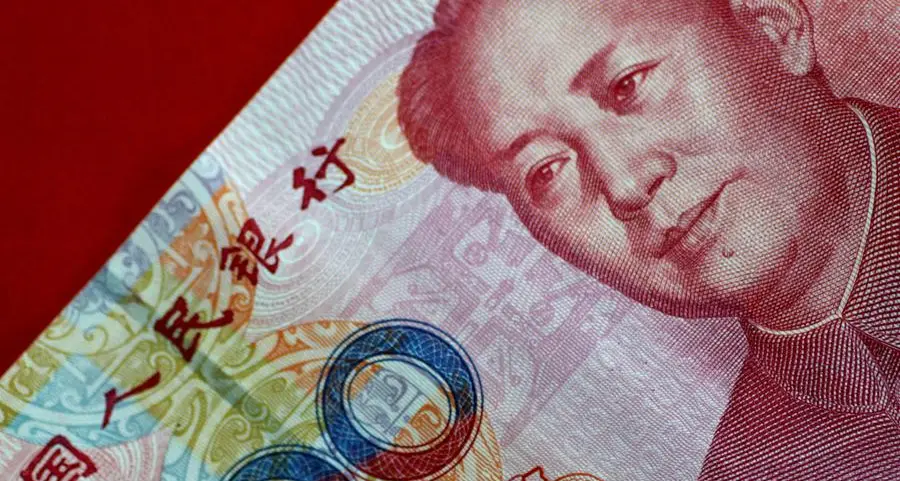 China's yuan slips as market weighs Fed rate path