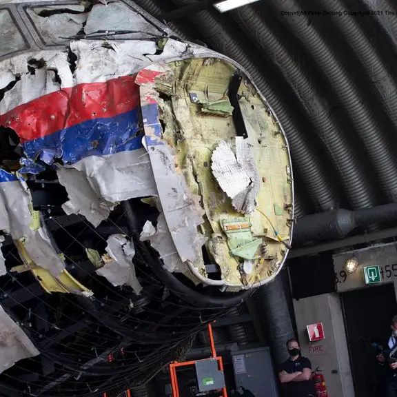 Australia sanctions three involved in downing of MH17