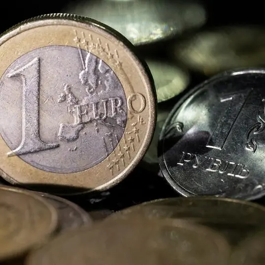 Russian rouble firms towards 62 vs euro, stocks down