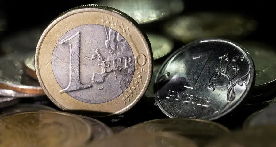 Russian rouble firms towards 62 vs euro, stocks down