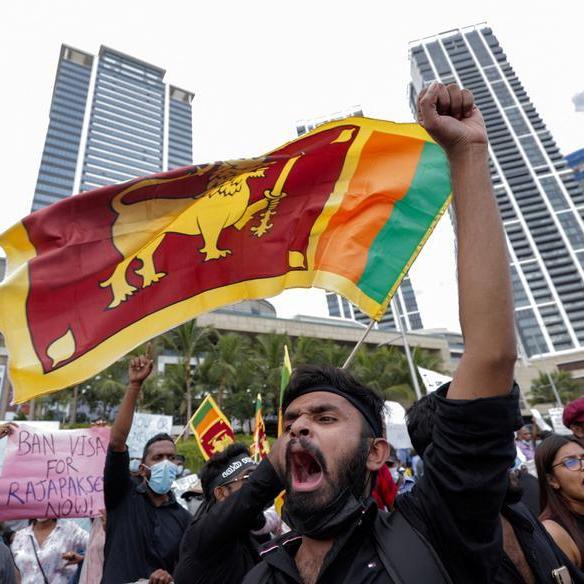 Sri Lanka awaits president's resignation after flight