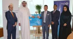 Commercial Bank and Alfardan Exchange win prestigious Prepaid Card award