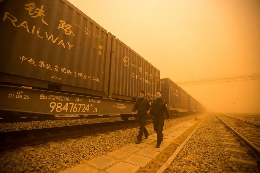 Thick sandstorms shroud Beijing, air quality plummets