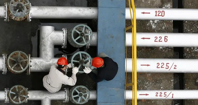 Oil prices slide as tepid Chinese demand counters US output concerns