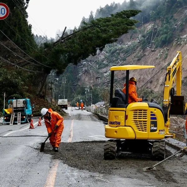 Japan quake survivors, without power or water, seek news on rebuild plans