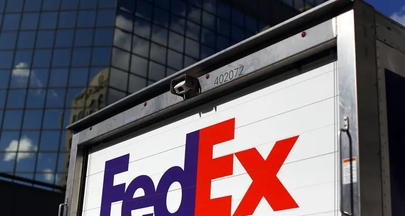 FedEx grilled on cost-cut plan after profits slide