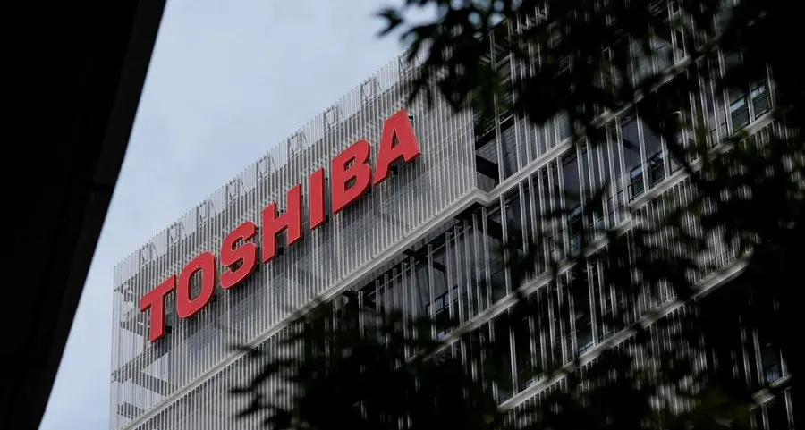 Toshiba cuts full-year profit estimate, COO resigns
