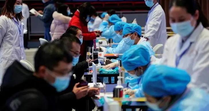 Shanghai widens COVID testing as other Chinese cities impose curbs