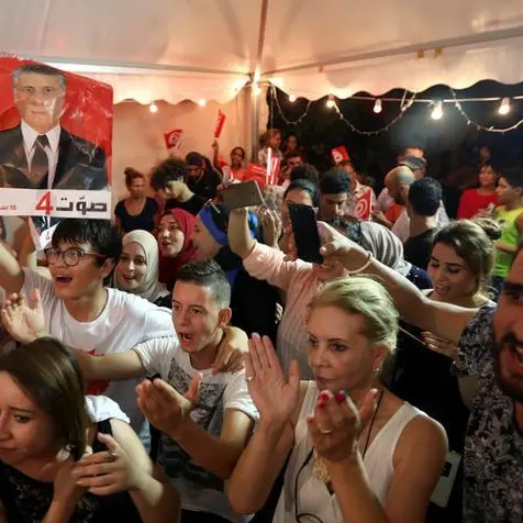 Tunisian establishment reels as outsiders claim election win