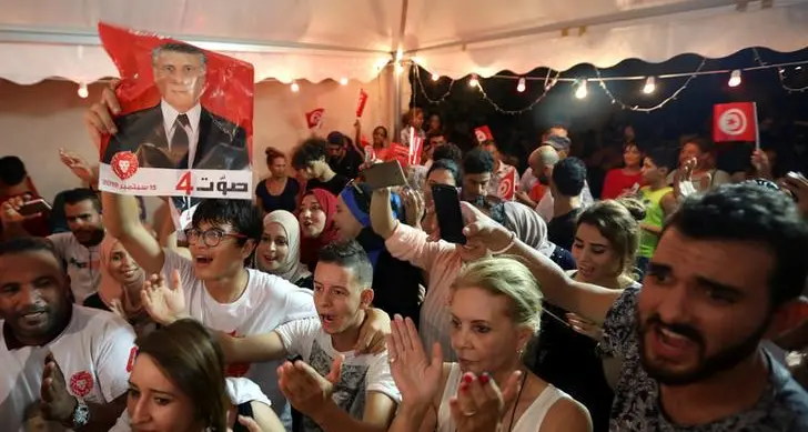Tunisian establishment reels as outsiders claim election win
