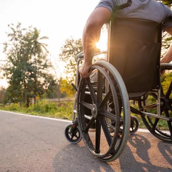 When a wheelchair-bound expat defied a rare condition to skydive