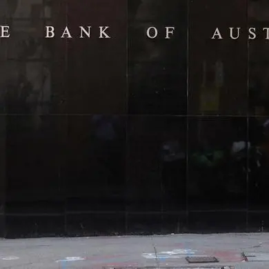 Australia c.bank cautions about housing boom as rates held at record lows