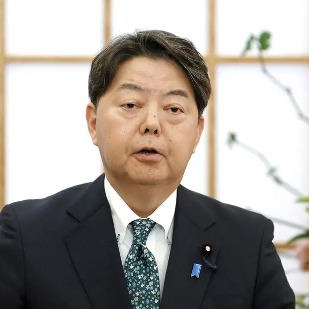 Japan's foreign minister calls for early release of detained national during talks in China