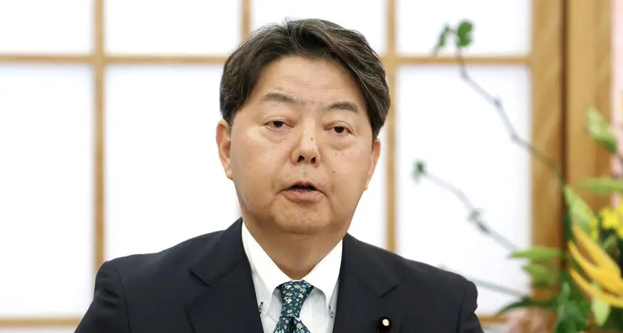 Japan's foreign minister calls for early release of detained national during talks in China