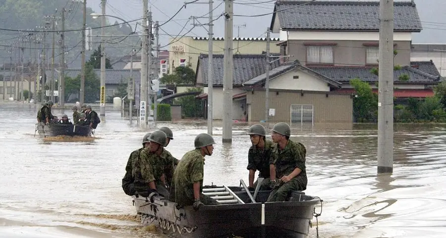 Rescuers comb muddy riverbanks after Japan floods kill six