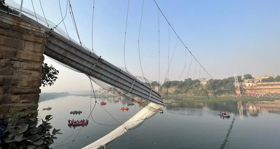 India's Gujarat state suspends senior local administrator for bridge collapse