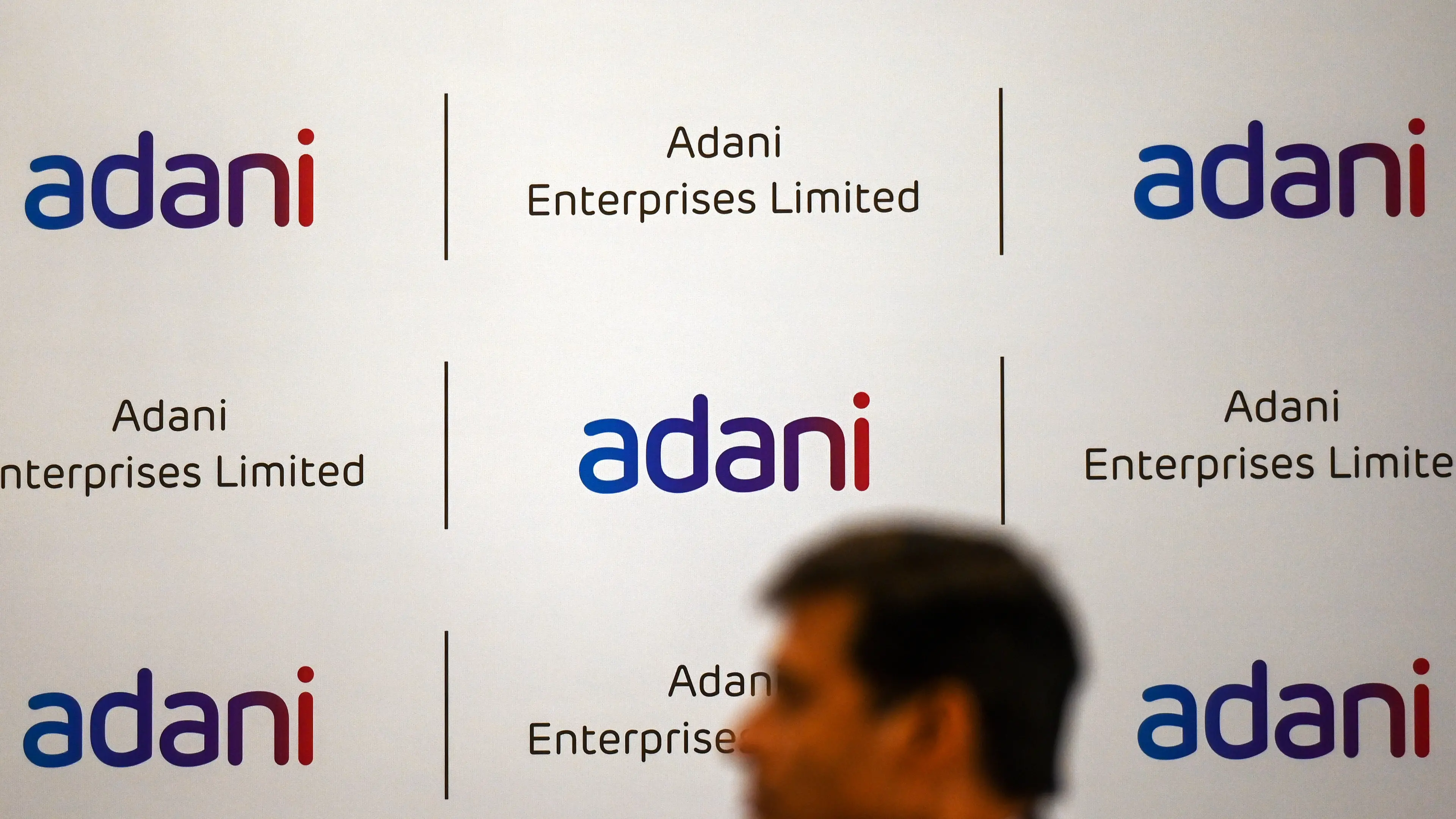 Who invested in billionaire Adani's share sale amidst stock rout?