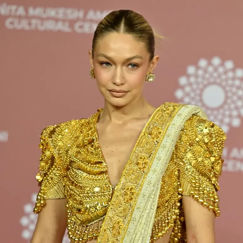 Gigi Hadid strikes a pose with Shah Rukh Khan at fashion exhibition launch in Mumbai