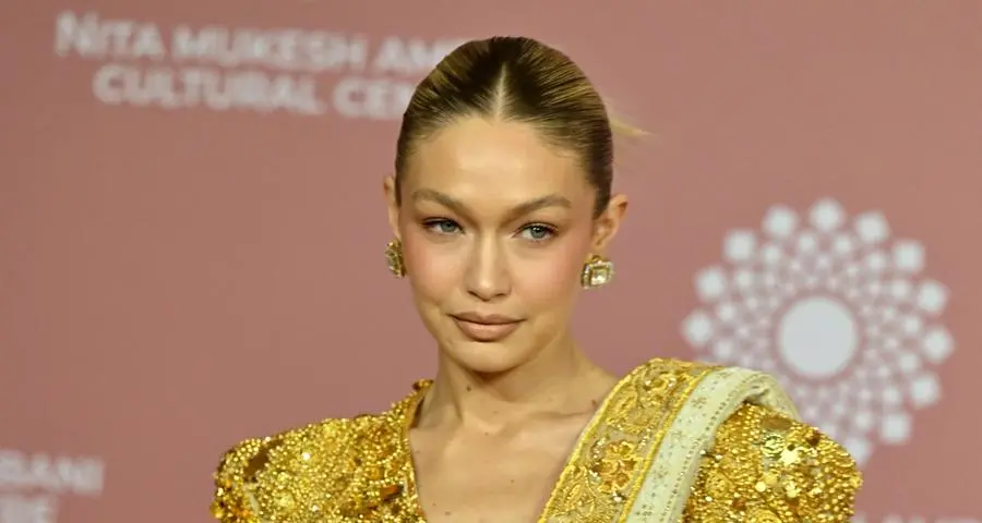 Gigi Hadid strikes a pose with Shah Rukh Khan at fashion exhibition launch in Mumbai