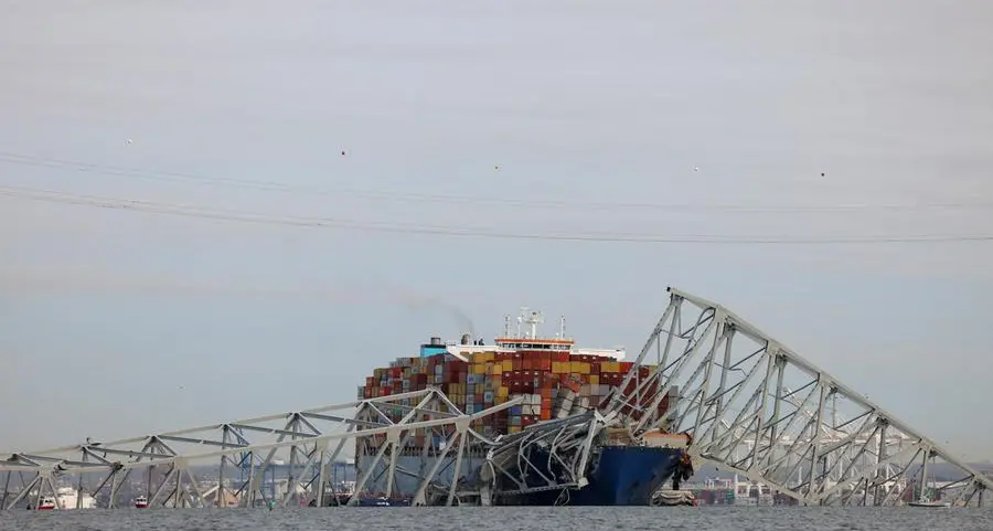 Baltimore bridge collapses after ship collision, sending vehicles into water