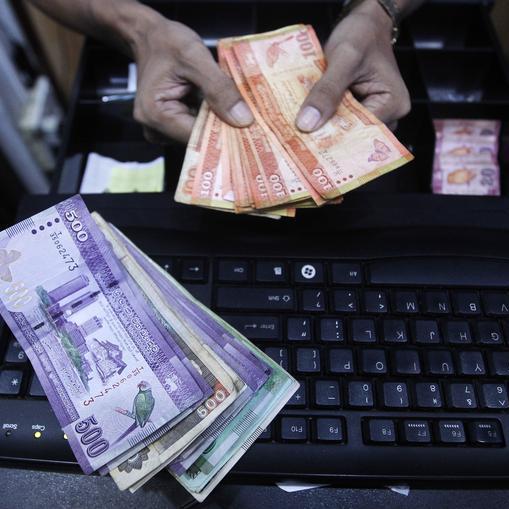 Sri Lanka dollar bonds extend declines as protests, political crisis continue