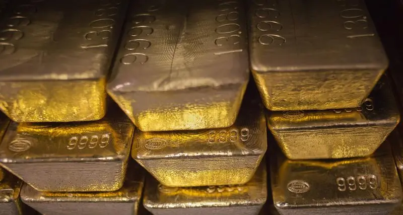 Gold rises on dollar weakness, US Fed meeting in focus