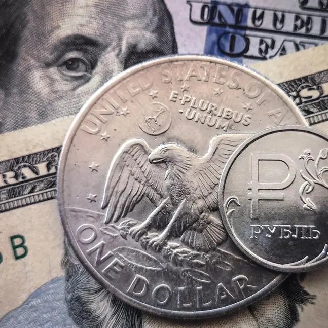 Russian rouble firms ahead of expected rate hike