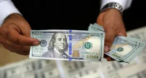 Dollar steady and London shares higher before Fed update on rates