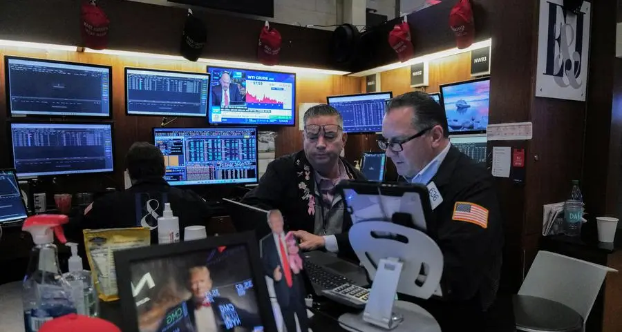 World stocks at record high as earnings hopes offset trade angst