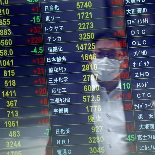 Japanese shares rise as automakers rally after report forecasts positive earnings