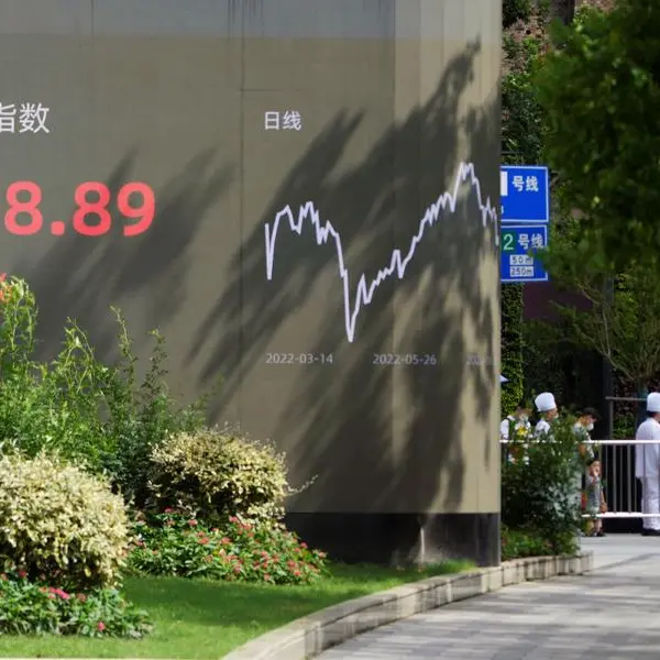 China stocks end lower as data signals industrial profit slump