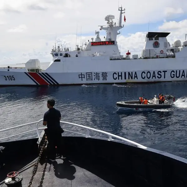 China warns Philippines not to 'stir up trouble' over disputed reef