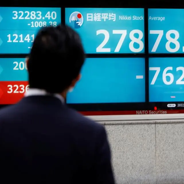 Japan's Nikkei ends firmer as investors buy shares after sharp drop